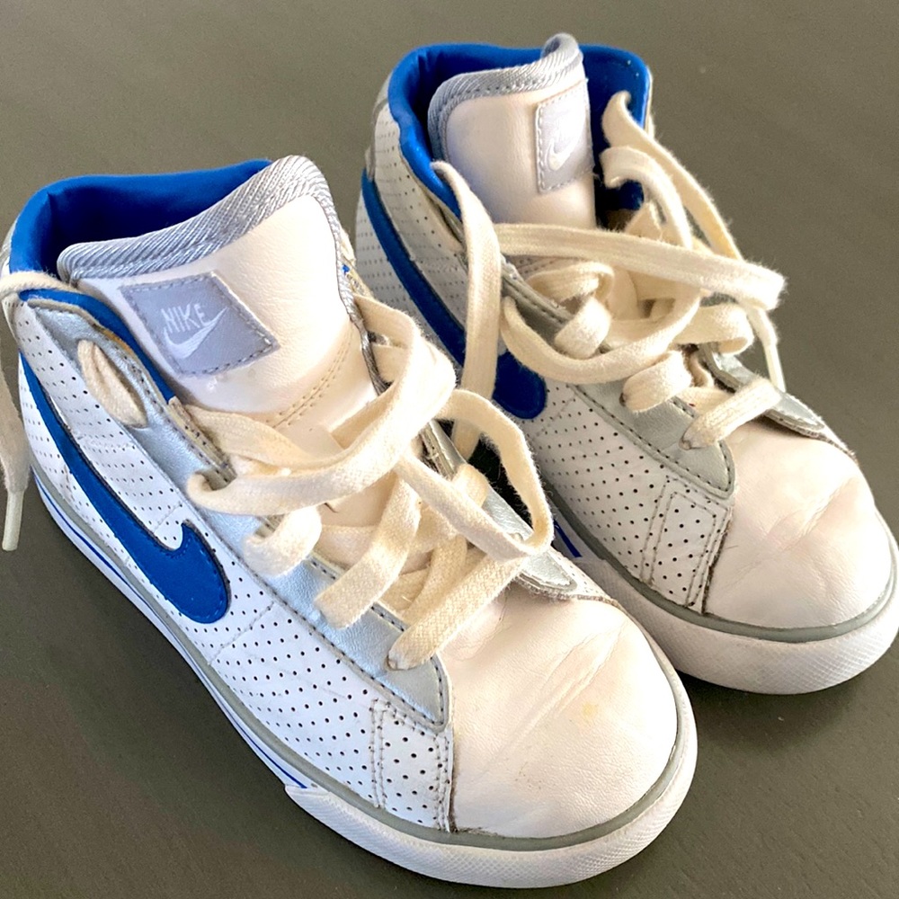 Nike. Size 9.5 toddlers. White with metallic and blue accents